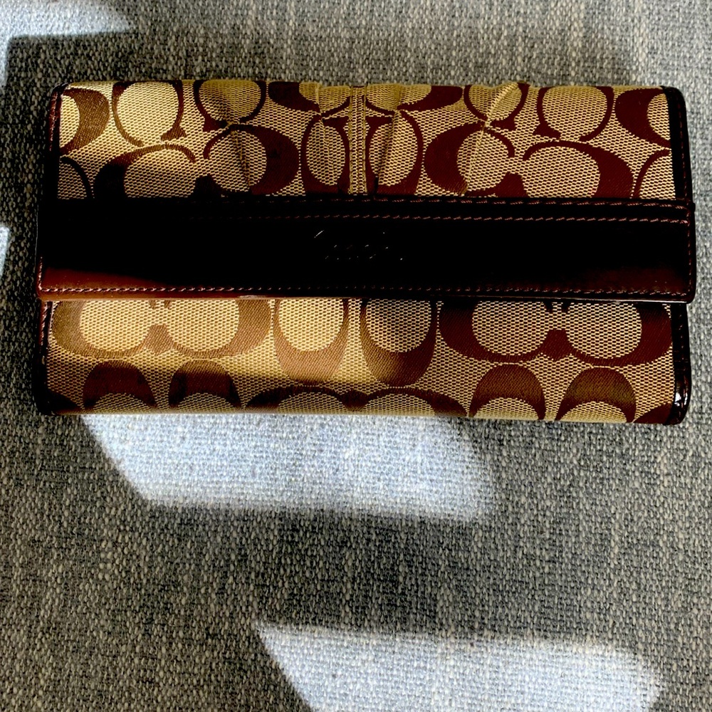 Authentic Coach slightly used wallet with check book